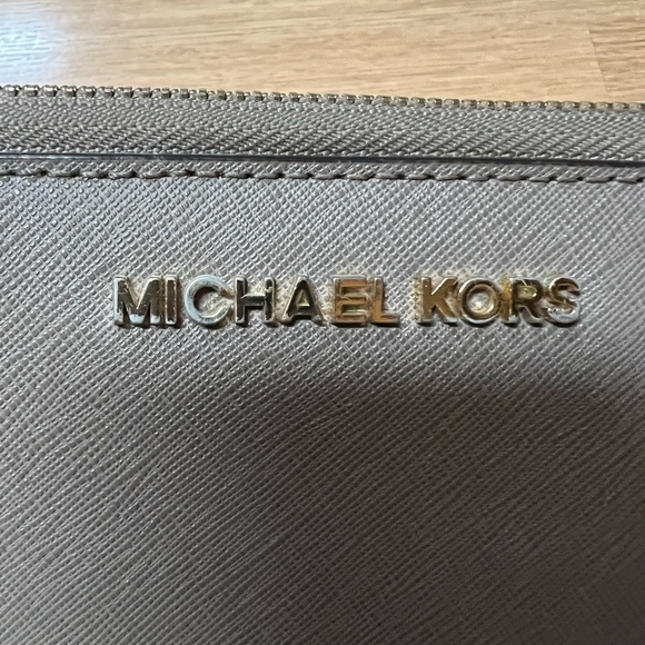 Michael Kors wristlet wallet taupe color good used condition. Gold slightly worn - Picture 3 of 6